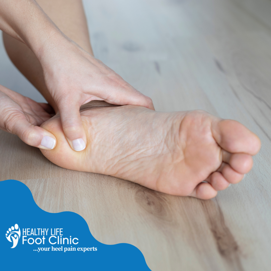 Woman Suffering From Heel Pain