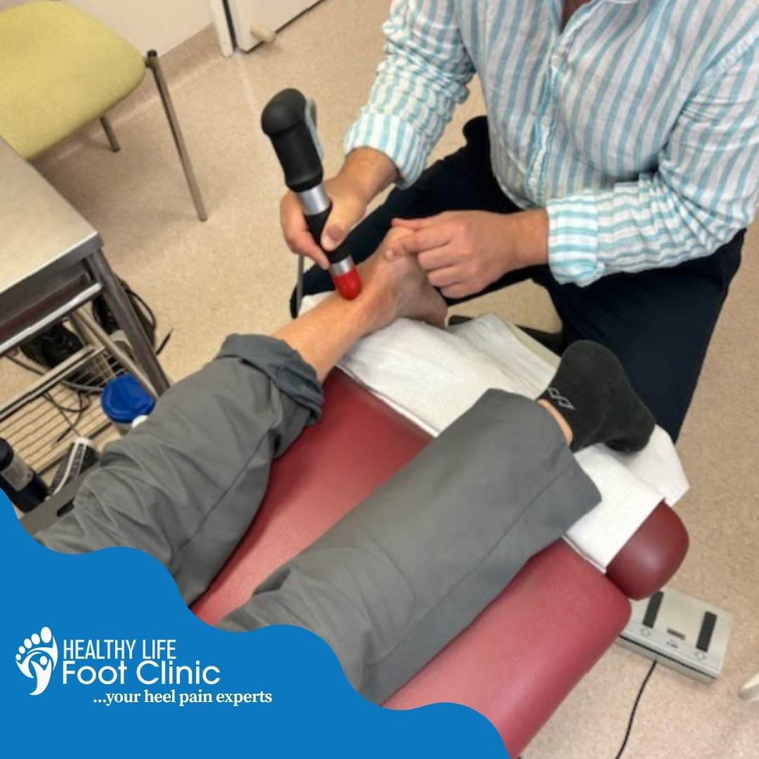 Adelaide Podiatrist, Joel Urban, Performing ETSW on a patient