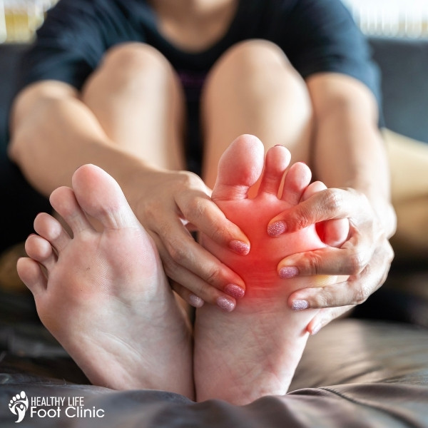 Person Suffering From Pain Under the Ball of the Foot